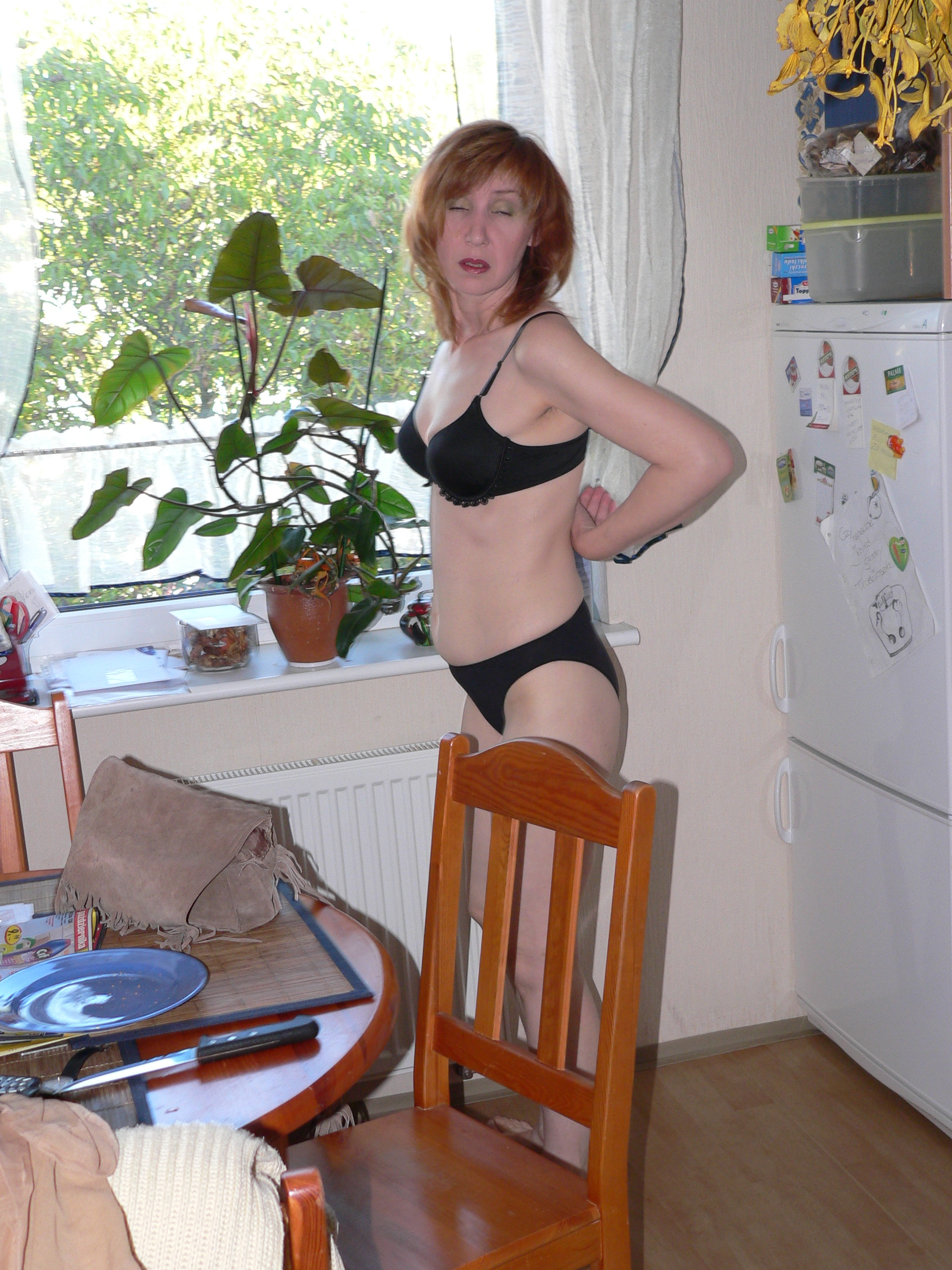 Adela's striptease at the kitchen — 8